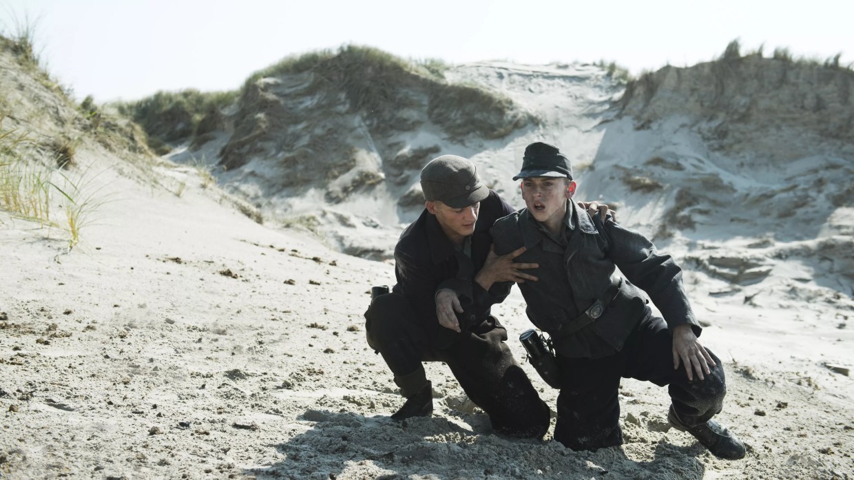 Ex-Nazis Dig Land Mines from the Beach in the Suspenseful <i>Land of Mine</i>