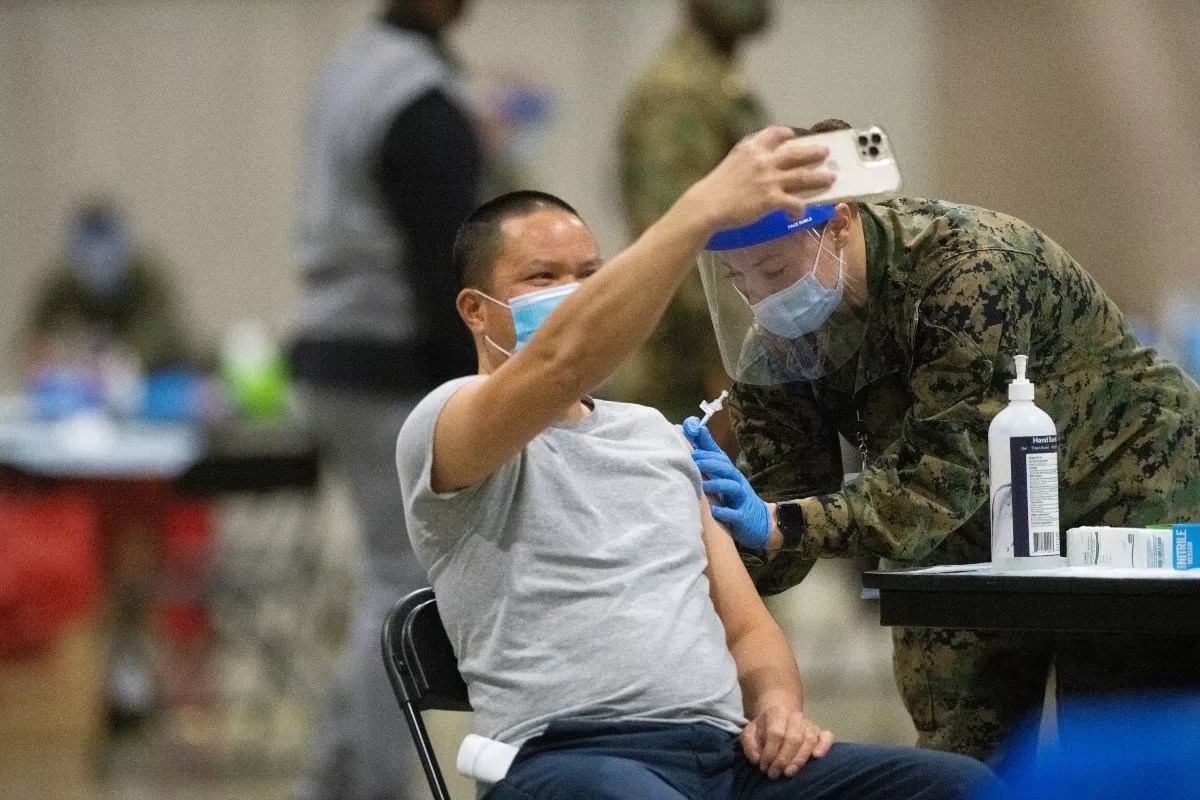 #TeamPfizer or #ModernaMob? It’s Tense in These Vaccine Streets