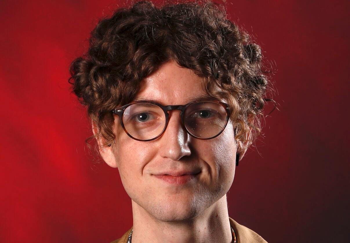 A journalist's headshot.